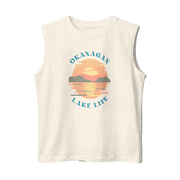 An off-white sleeveless muscle tank top featuring a retro-style graphic of a sunset over a lake with the text 'OKANAGAN LAKE LIFE' in blue.